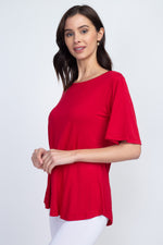 red scoop neck blouse