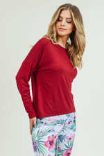 red long sleeve open back top